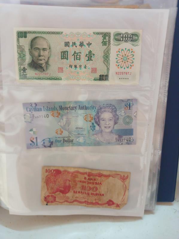 An album of approximately 86 world bank notes. - Image 2 of 26