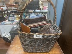 A wicker basket and purses