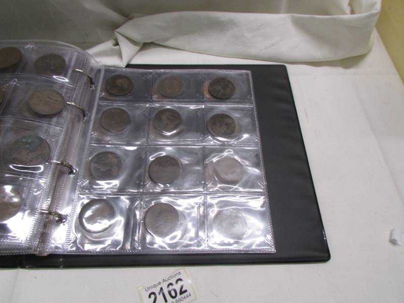 An album of in excess of 300 world coins. - Image 14 of 16