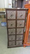 A tall carved 10 drawer chest, COLLECT ONLY.
