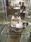 A four piece silver plate tea set.