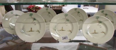 Seven Royal Doulton 'The Coppice' hand painted tea plates.