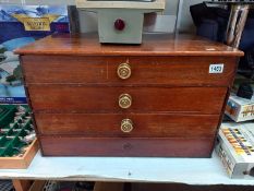 A 4 drawer cutlery cabinet (top drawer being a hinged lift lid)