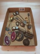A silver 'Wendy' necklace, a silver £1 note charm, an unmarked pill box, enamel spoons etc.,