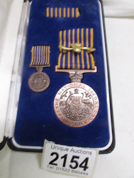 An Australian cased National Service Medal for Ernest Margo Fabri. - Image 2 of 2