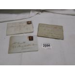 Three 19th century envelopes - one with 1841 penny black with Maltese cross postmark, 1842 penny