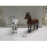 A Beswick Dartmoor pony and another Beswick pony, in good condition.