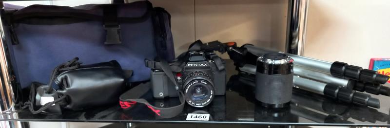 A Pentax 35mm camera (model A3) with carry bag, extra lenses & tripod etc.