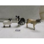 A Beswick Border Collie, Calf and Lamb, in good condition.