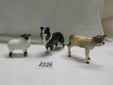 A Beswick Border Collie, Calf and Lamb, in good condition.