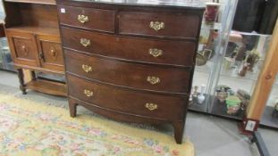 A Victorian mahogany bow front chest of drawers with brass handles, COLLECT ONLY.