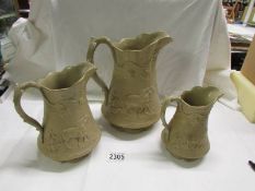 A set of three Victorian graduated hunting scene jugs by Edward Walley, Cobridge, Staffordshire.