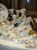 A good selection of collectors china shoes. Collect Only.