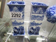 A pair of Cauldon blue and white Italian pattern vases.