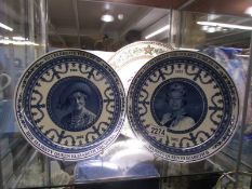A Spode Queen Mother 80th birthday plate and two Wedgwood blue and white plates of the Queen and the