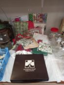 A mixed lot of napkins, handkerchiefs, Xmas gift wrap, table mats etc.
