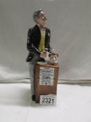 A Royal Doulton figure - The Auctioneer, HN2988