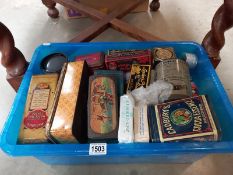 A box of vintage tins and packets