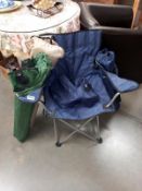 A quantity of folding canvas chairs