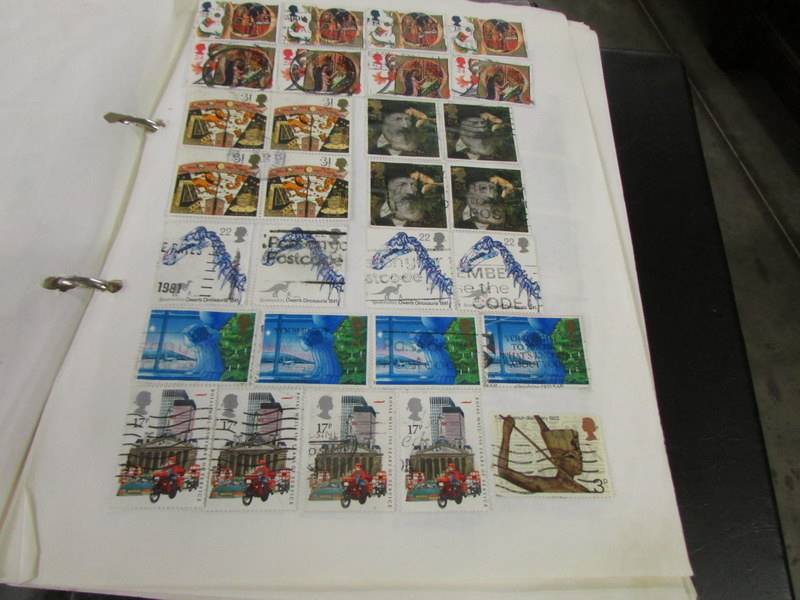 A collection of UK stamps in five albums/folders. - Image 9 of 14