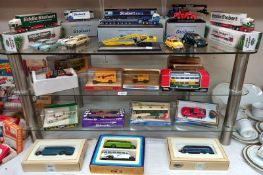 A quantity of boxed die cast vehicles including Stobart Transport & Corgi's etc.