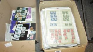 Two boxes of mint and used GB and World stamps.