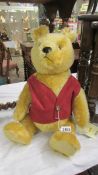 A Steiff limited edition Winnie the Pooh bear.