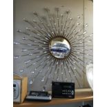 A sunburst style mirror. Collect Only.