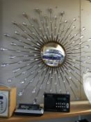 A sunburst style mirror. Collect Only.