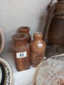 3 stoneware bottles, one labelled 'Ginger beer - Norwich and Swaffham'
