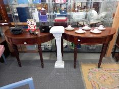 A pair of mahogany D shaped side tables. COLLECT ONLY.