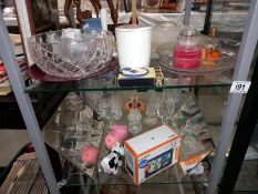 2 shelves of miscellaneous items including glassware, sat nav, etc