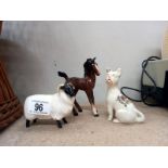 A Beswick ram, a Beswick foal (minor chip to ear) and a crested ware Pug - city of London