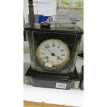 A black slate mantel clock, spring ok,. COLLECT ONLY.