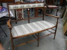 A Edwardian mahogany two seat settee. COLLECT ONLY.