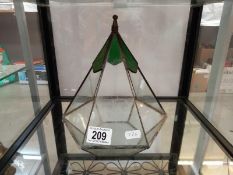 A triangular leaded stained glass plant holder/terrarium