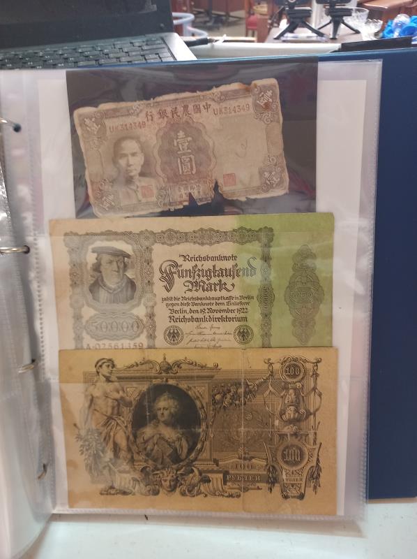 An album of approximately 86 world bank notes. - Image 16 of 26