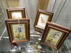 Four miniature framed studies of game birds on silk.