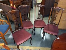 A set of four dining chairs. COLLECT ONLY.