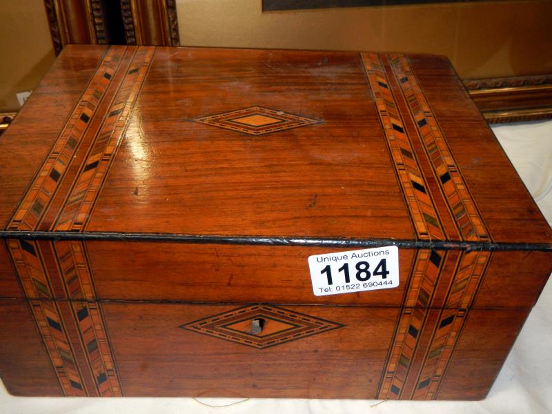 A Victorian inlaid sewing box