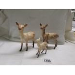 Two Beswick deer and a Beswick faun, in good condition.