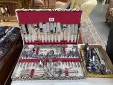 A complete boxed canteen of cutlery and a box of miscellaneous cutlery