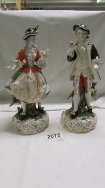 A pair of Kunst Dresden Art figures.