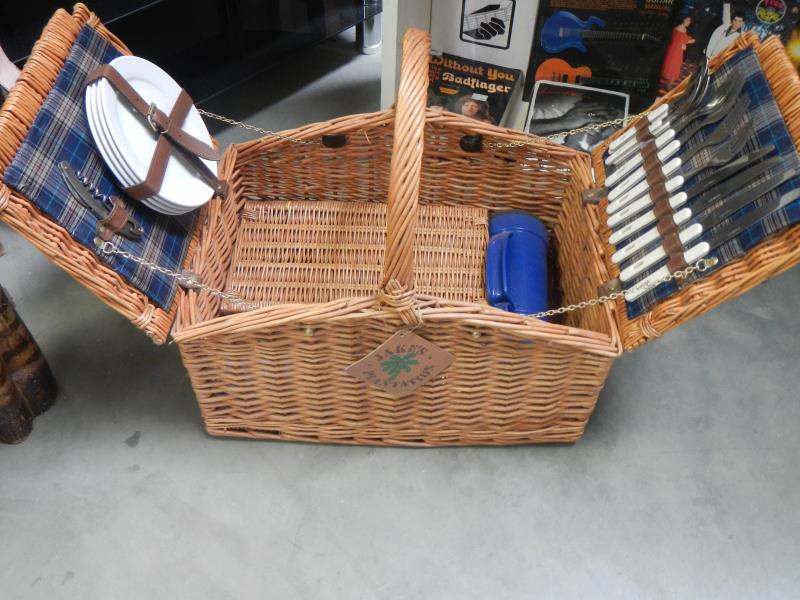 A double lidded picnic basket set (complete)