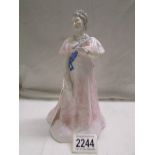 A Royal Worcester figurine, Her Majesty Queen Elizabeth The Queen Mother, 17/9000.