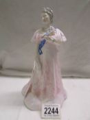 A Royal Worcester figurine, Her Majesty Queen Elizabeth The Queen Mother, 17/9000.
