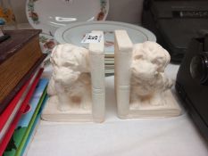 A pair of plaster dog bookends