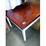A mahogany top side table