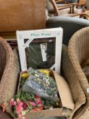 A DIY floral display picture frame and a box of artificial flowers