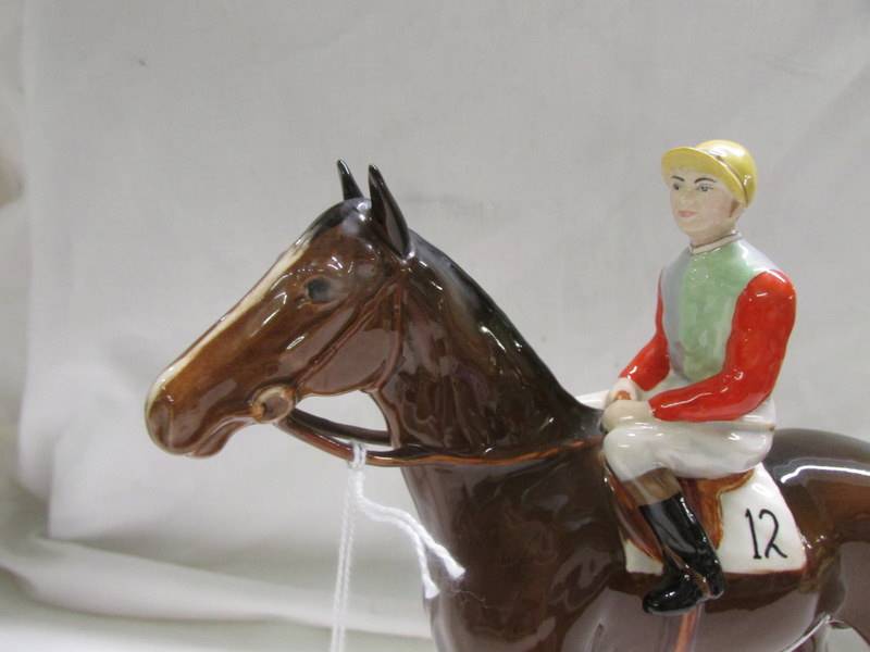 A Beswick horse with jockey, 1963-1984. In good condition. - Image 2 of 3